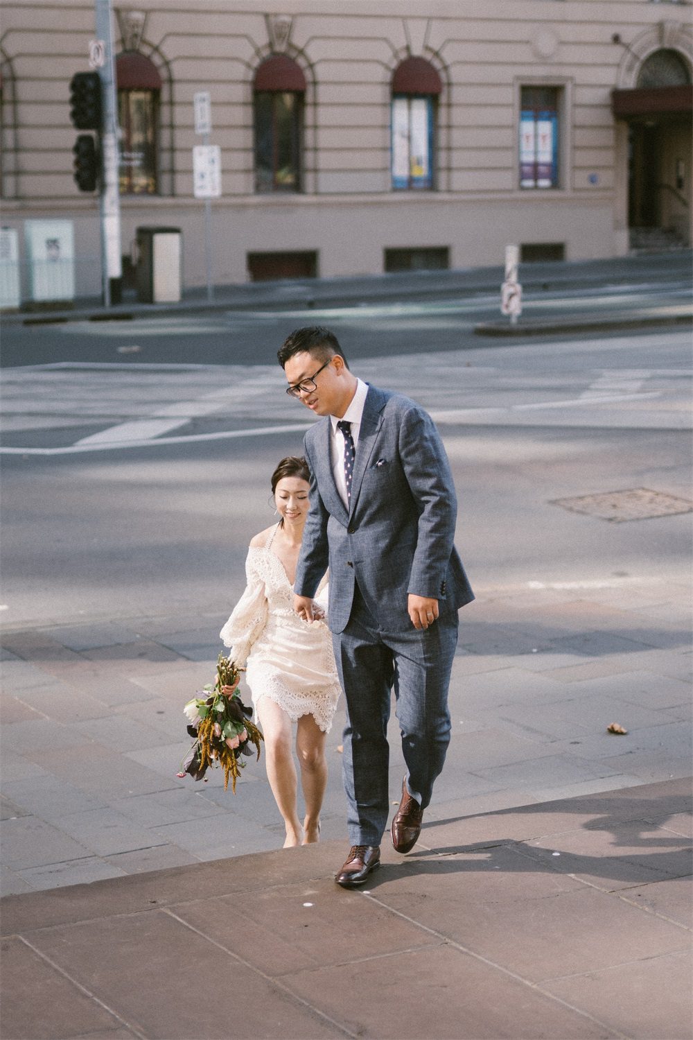 Preparations for trying on and adjusting wedding photography clothing in Melbourne