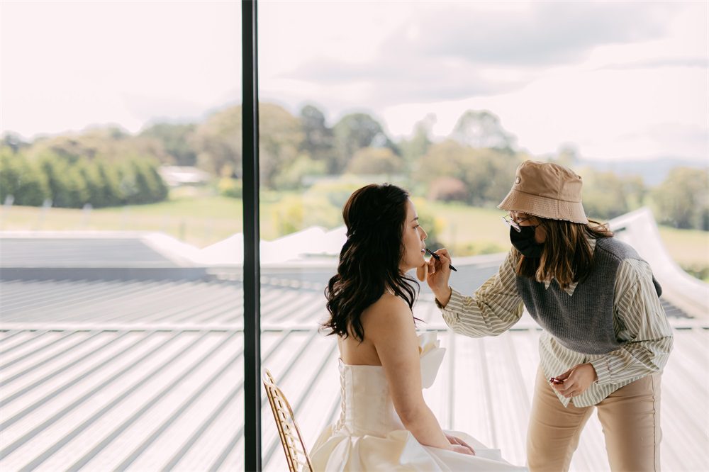 Melbourne wedding photography features light wedding dresses without veils and a simple style.
